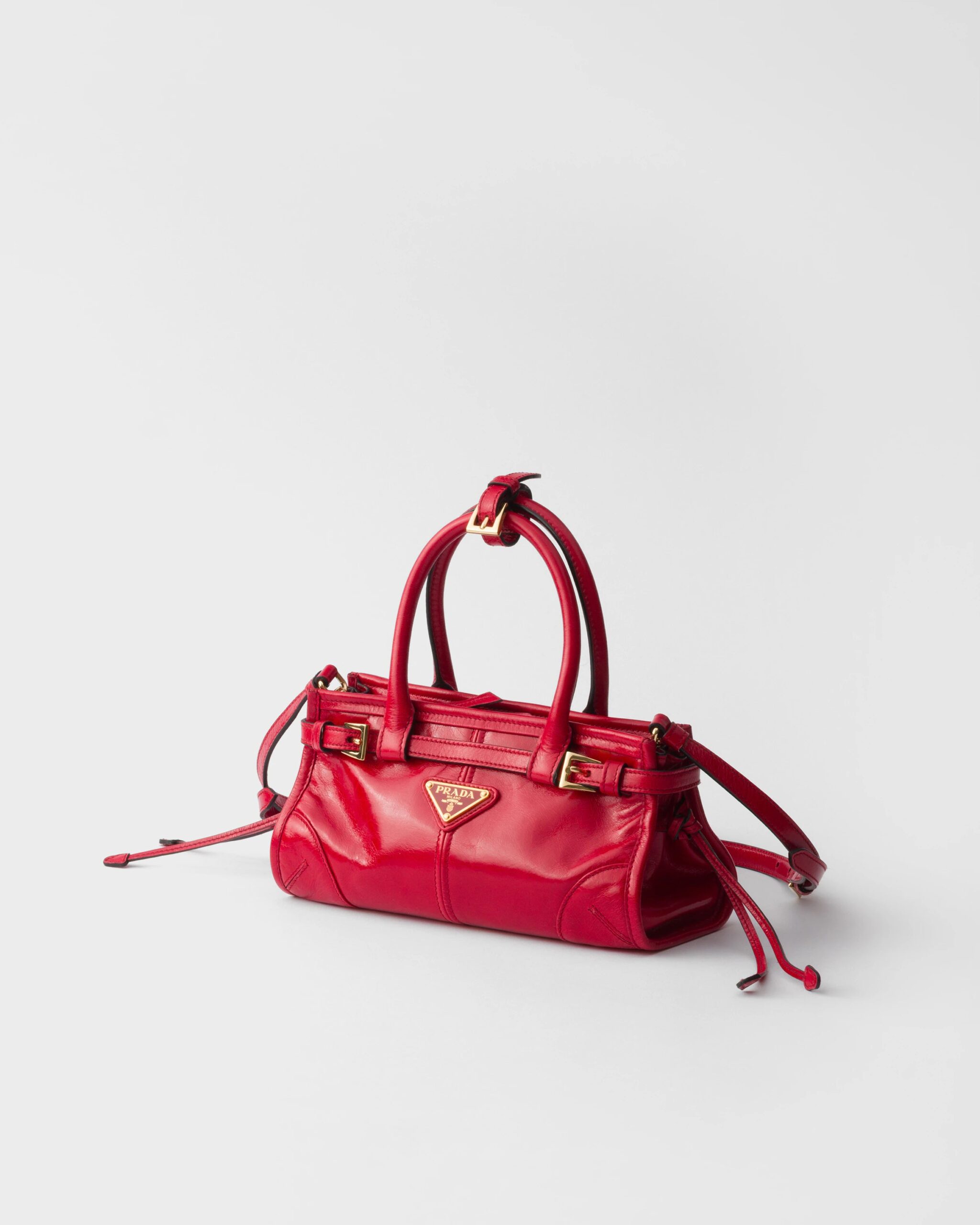 prada us 571f7f4e7ca283be8efb777d.jpg Prada Bonnie leather mini handbag - Red