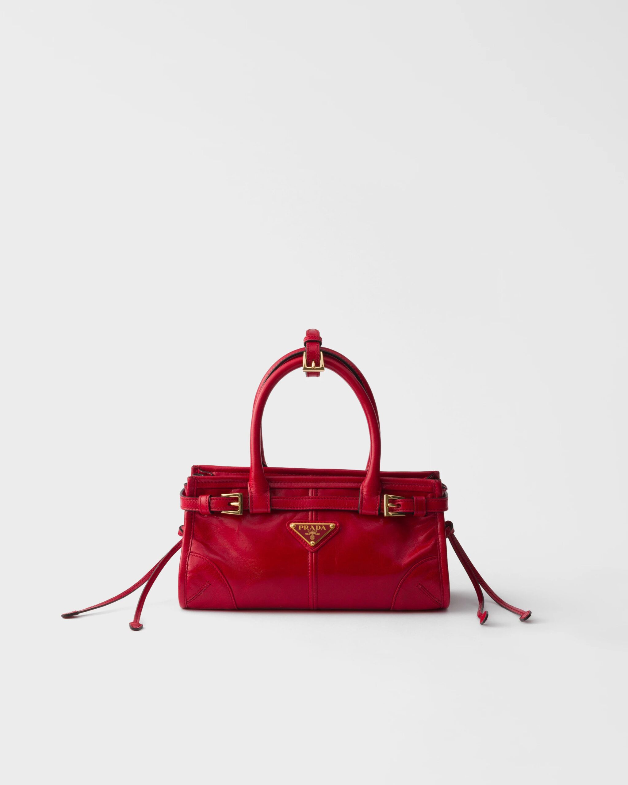 prada us 75637ececbd0dbb40dbf0776.jpg Prada Bonnie leather mini handbag - Red