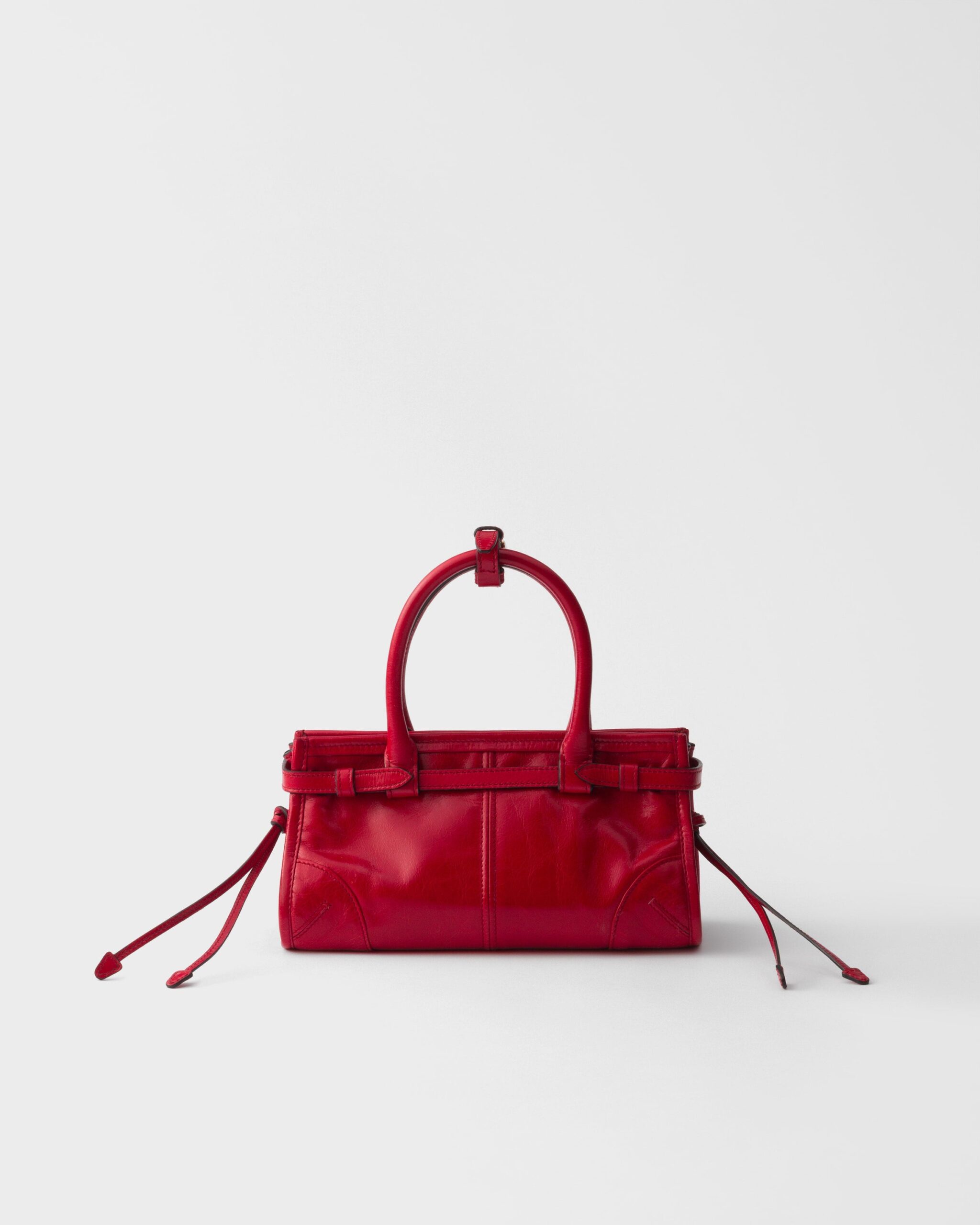 prada us 98f7837e25a29c6b6ee1f020.jpg Prada Bonnie leather mini handbag - Red